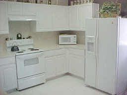 Great Kitchen with lots of cabinets, open to family room & has breakfast area