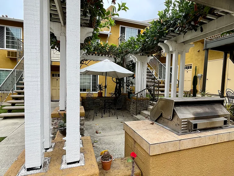 Enjoy sunny San Diego days in the peaceful courtyard with BBQ and seating_ideal for low-key gatherings