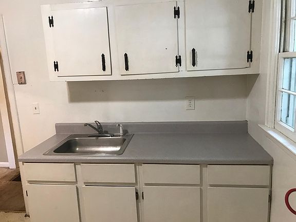 Kitchen sink and cabinets 
