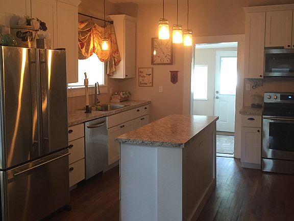 Kitchen w/ unique lighting 