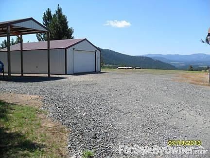 Shop and covered RV area. : Plenty of room to store all your toys inside and out.