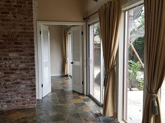 this home has many sliding glass doors....very open feeling and tons of natural lighting