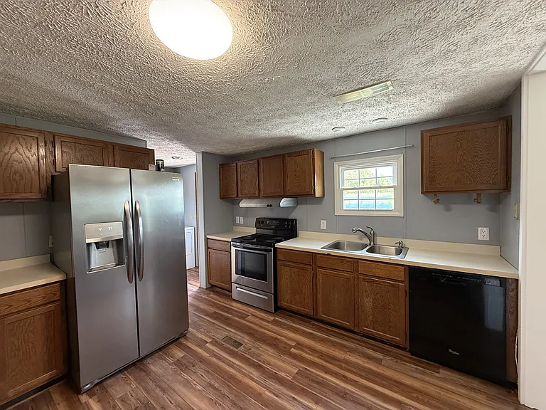 Kitchen with view of appliances