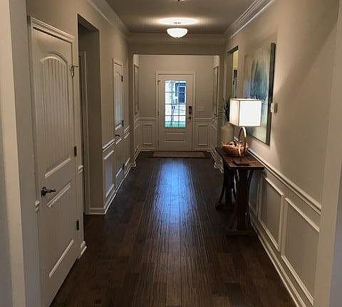 Entry foyer with hardwoods-model home-options and selections may vary