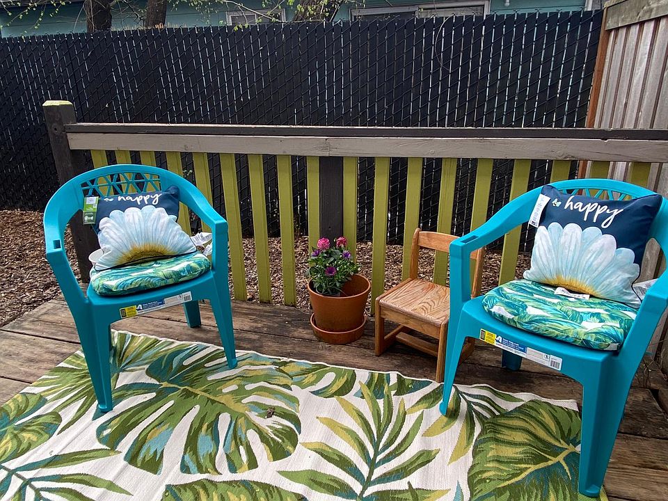 This apartment has a large, private backyard, and this nice little deck.