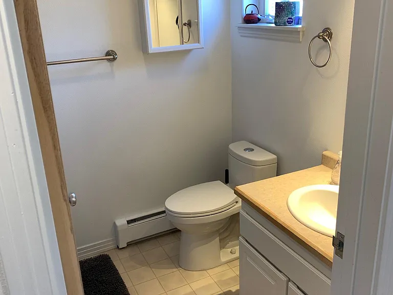 Full bath on second floor with shower and tub.