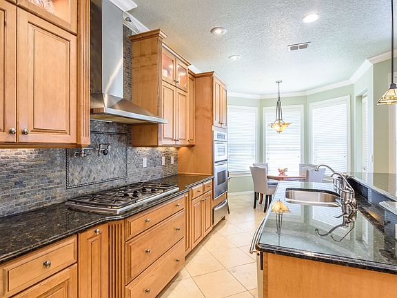 Pot filler above stove top
