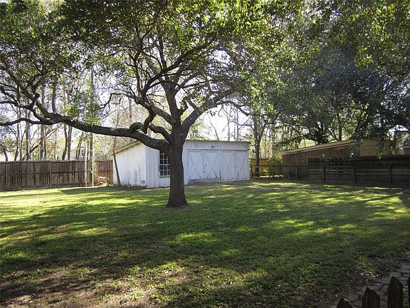 TWO CAR DETACHED GARAGE AND WORKSHOP ON A CONCRETE SLAB
