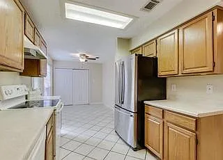 Kitchen with SS fridge included
