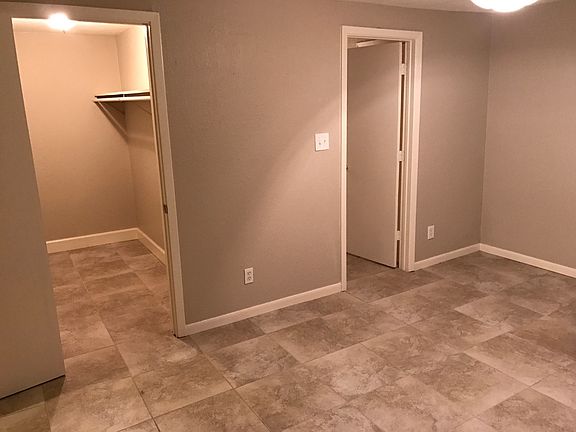 Bedroom with walk-in closet and on suite bathroom