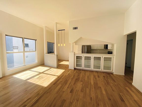 Spacious living room, dining area and kitchen