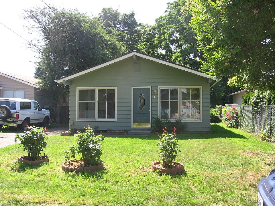 Front of house and yard