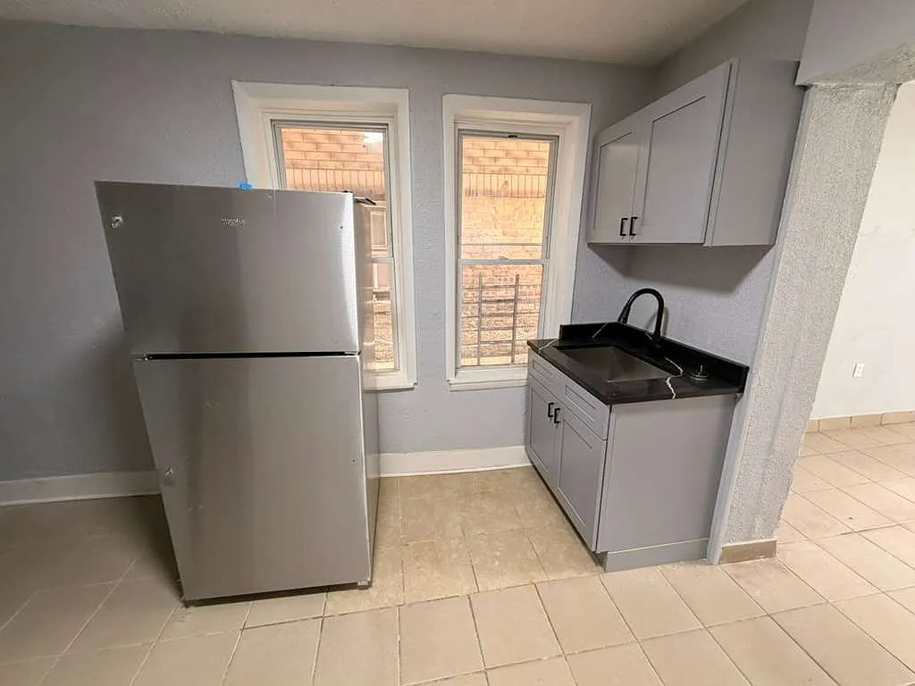 Building Photo - 8927 S Muskegon Ave #1A