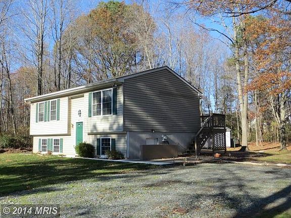EXTERIOR FRONT TREED YARD