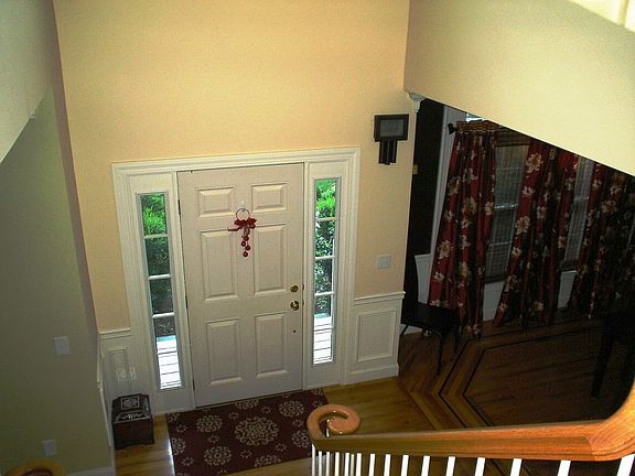Greet your guests in style w/ this two story foyer