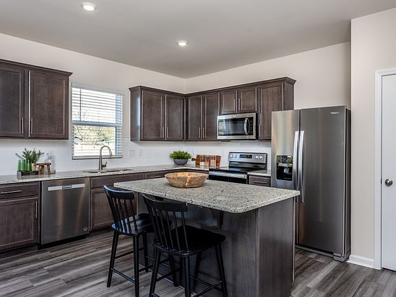 Subway Tile Kitchen Backsplashes. Photo of Model Home.