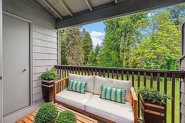 Enjoy tranquil moments on this beautiful balcony overlooking vibrant greenery. Enjoy tranquil moments on this beautiful balcony overlooking vibrant greenery.