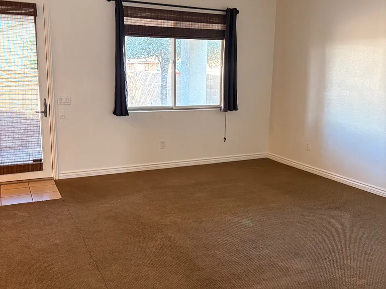 Family Room off Kitchen leading to backyard