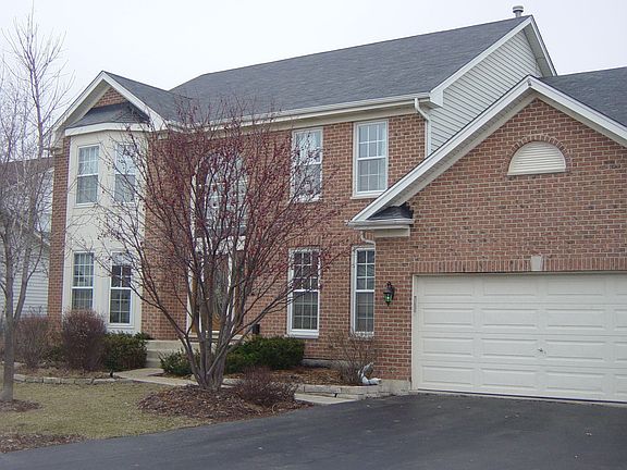 Front showing att. garage