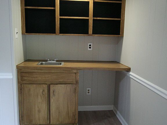 WET BAR IN FAMILY AREA. YOUR COVERED PATIO IS JUST OUT OF SIGHT ON YOUR RIGHT.