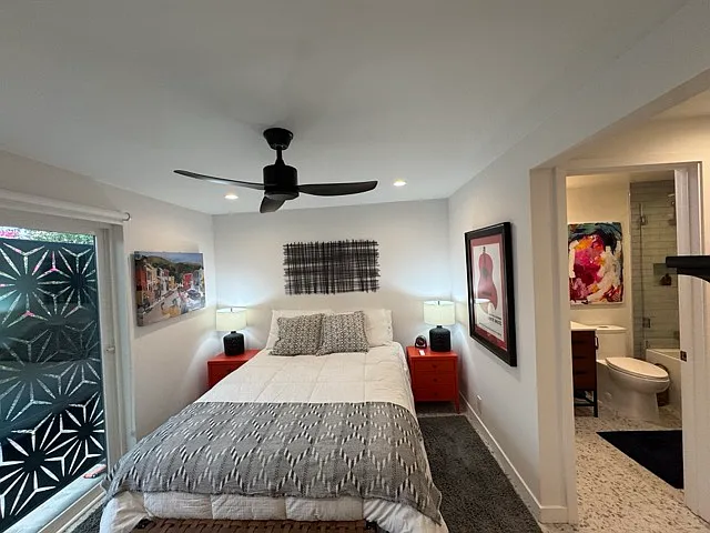 Bedroom 2 from west showing exterior, bedroom and en suite bath.