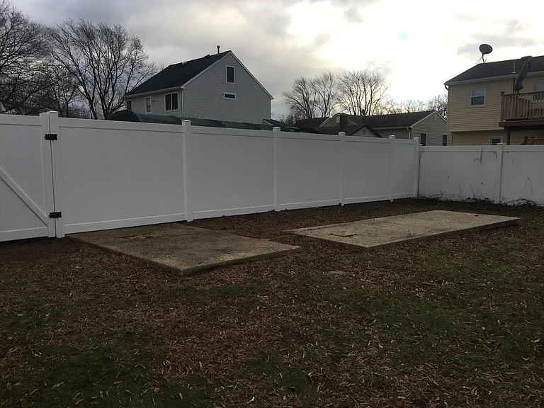 backyard with new pvc fence