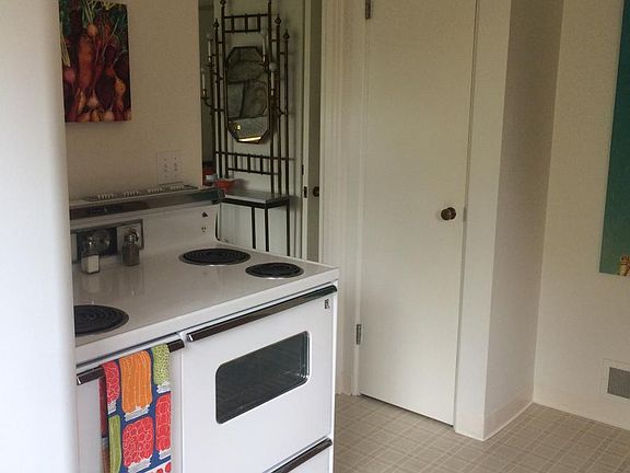 Kitchen with Stove and Pantry