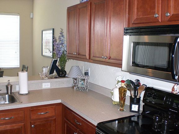 Cherry Cabinets, Stainless Appliances