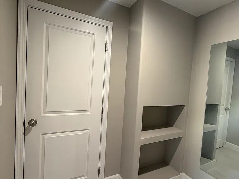Custom built-in shelving with modern storage design