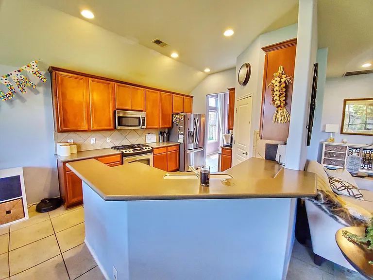 Kitchen with lots of cabinets and large countertop space
