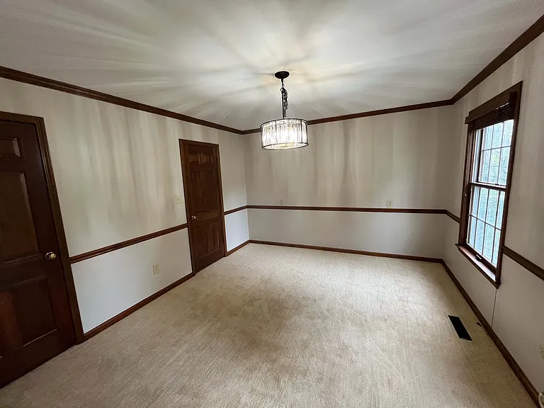 Main floor study or 5th bedroom with private entry to main floor bathroom