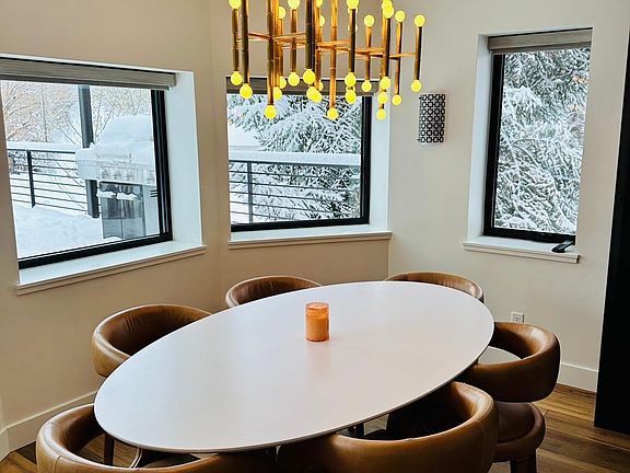 Dinning room with a nod to midcentury furnishings.