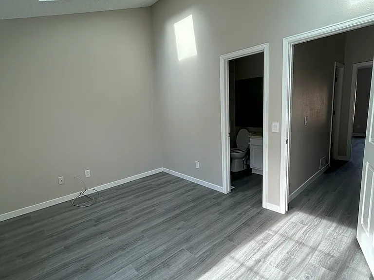 Bedroom #1 13' x 12' 6" with private porch and en suite full bathroom