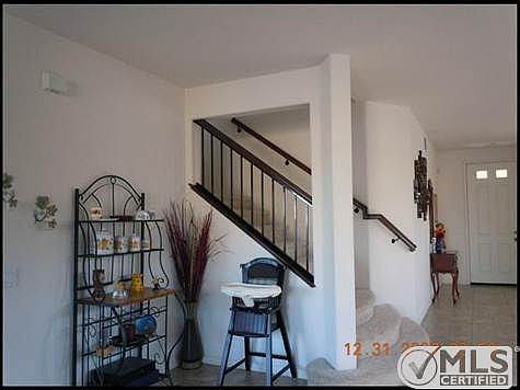 corner nook before going up the stair to bonus room, and bed