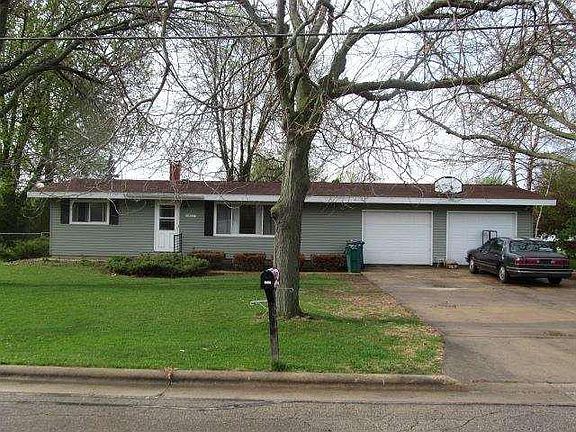 right garage with this unit, and neighboring apartment front door