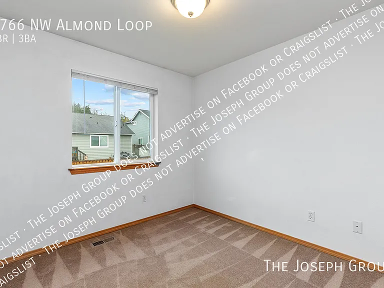 1766 NW Almond Loop — Photo 28