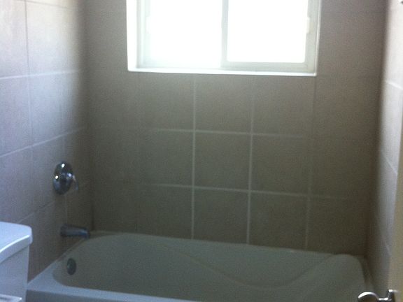 Tiled shower with soaking tub
