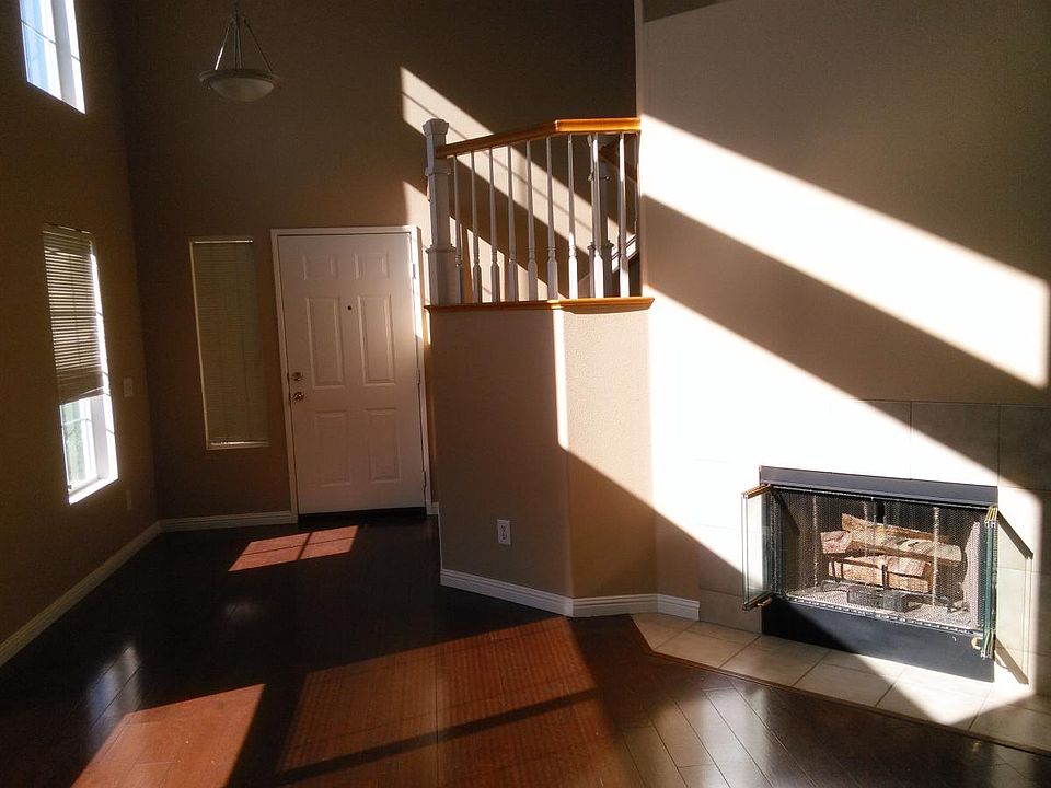 Formal living room with fireplace.