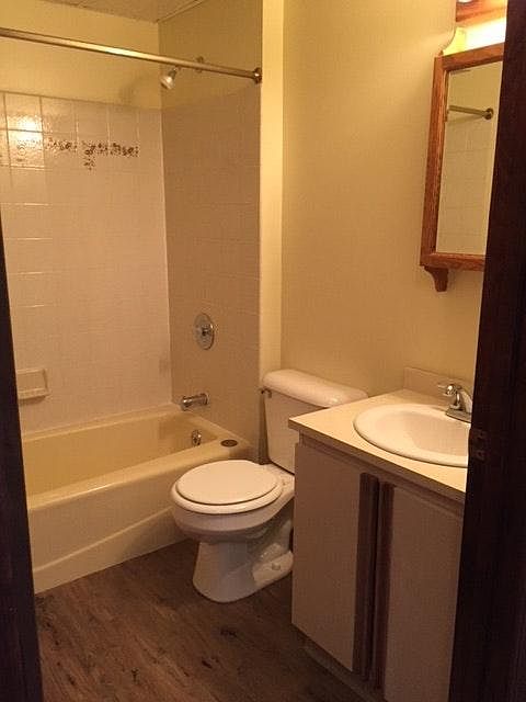 Full bathroom with tub and shower