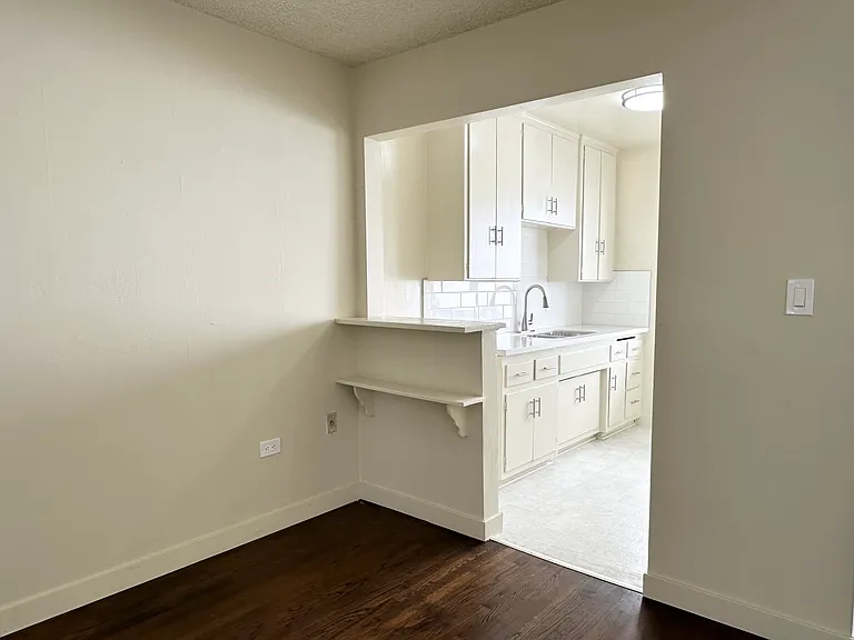 Dining room with view to kitchen