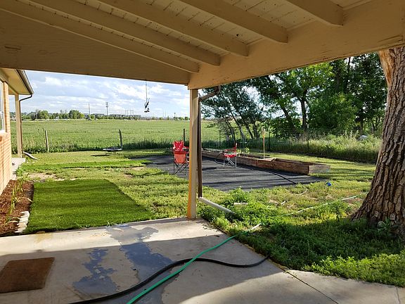 Backyard with raised garden beds