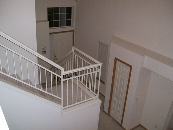 2 story-looking to front door