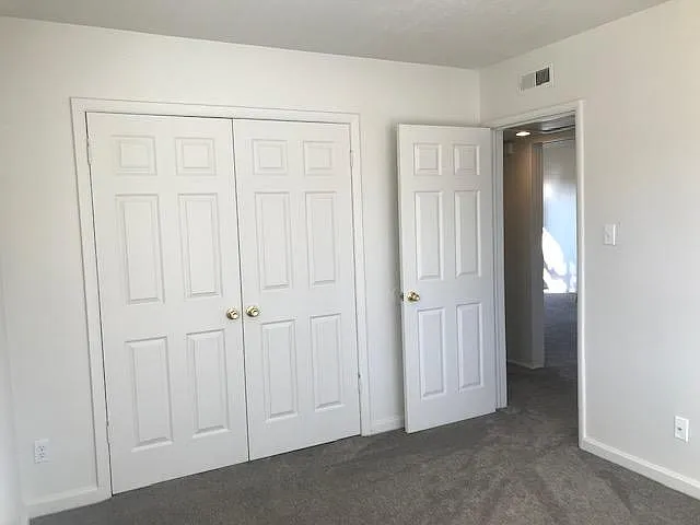 Picture of the second bedroom which can be used as an office. Internet & cable access is found in the office & living room.
