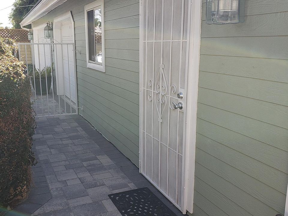 Front door and private, paved yard