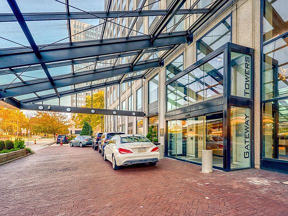 Front driveway entrance with doorman