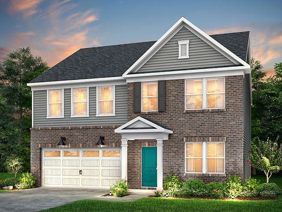 Hampton Exterior CR104 features brick, siding, covered front door and 2 car garage