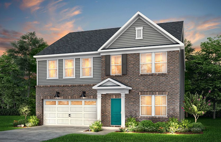 Hampton Exterior CR104 features brick, siding, covered front door and 2 car garage