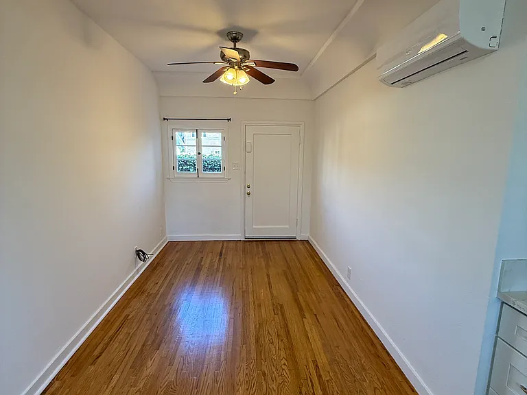 Living Room with Ceiling Fan and Central A/C