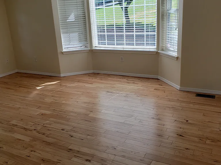 living room to right of entry with bay window