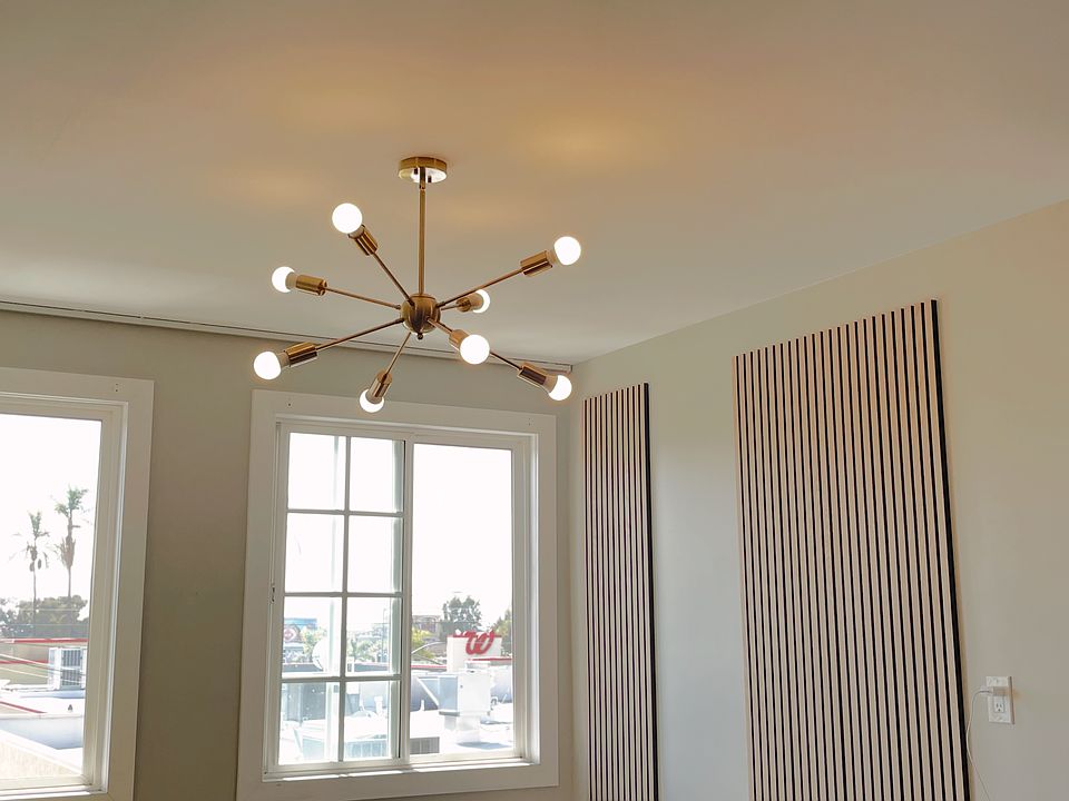 Living Room with brand new chandelier